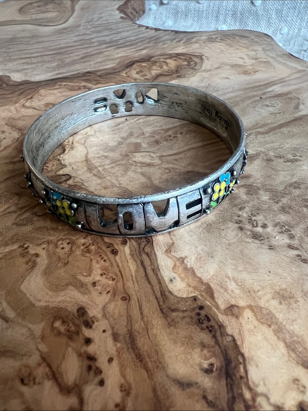 Silver-Tone 'LOVE' Bangle with Yellow & Blue Flower Accents